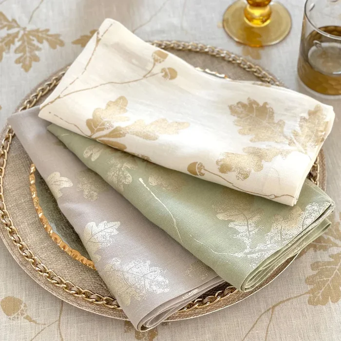 Bodrum Acorn 100% linen metallic print napkins and runnerslinens