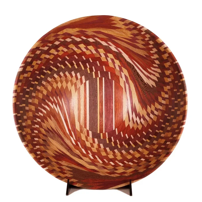 One-of-a-kind heirloom bowl in 16 tiers of swirling wood patternswood bowl